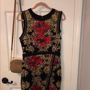 Lace dress with beautiful roses stitched in !
